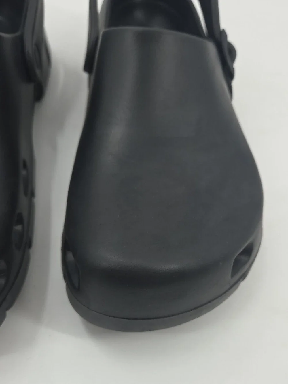 Birkenstock Black Foam Clogs with Heel Strap
